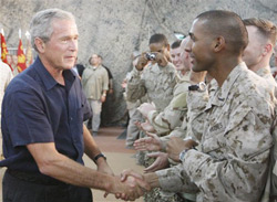 President Bush greets troops in Anbar province, Iraq. (Photo: AP) 