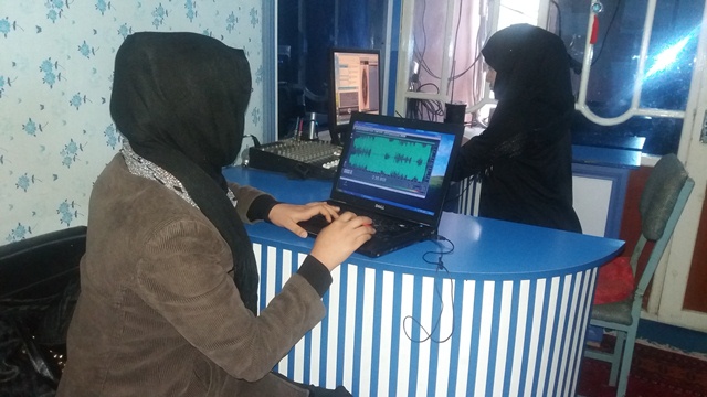 Women journalists work at Radio Roshan