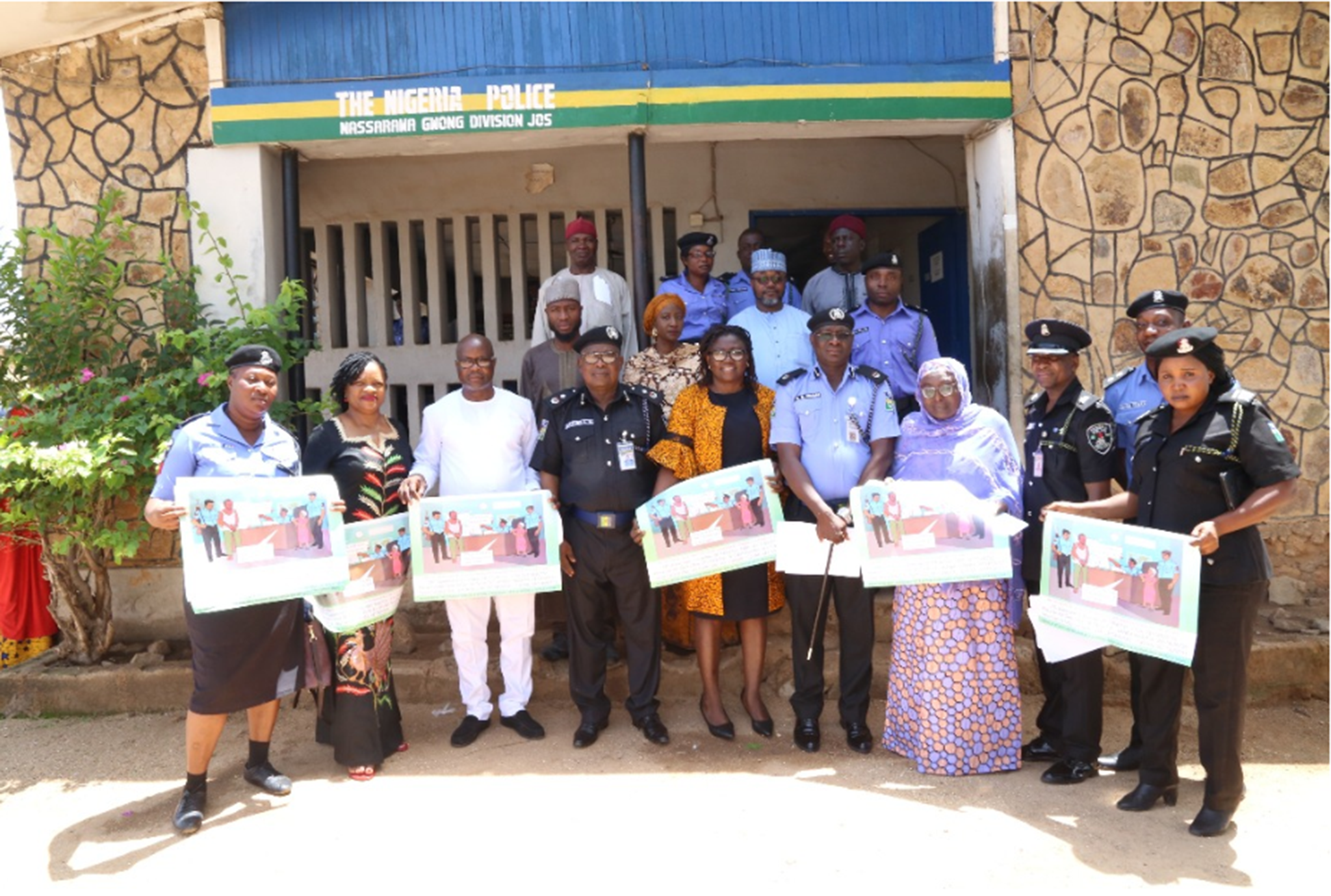 Community leaders and police in Jos, Nigeria, gather in May to inaugurate a unit to combat sexual and gender-based crimes.