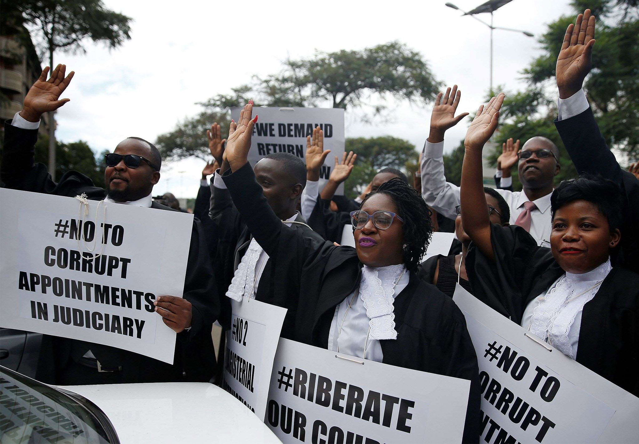 Zimbabwean lawyers march to demand justice for people detained in the government’s crackdown on violent protests in January 2019. (Philimon Bulawayo/Reuters)