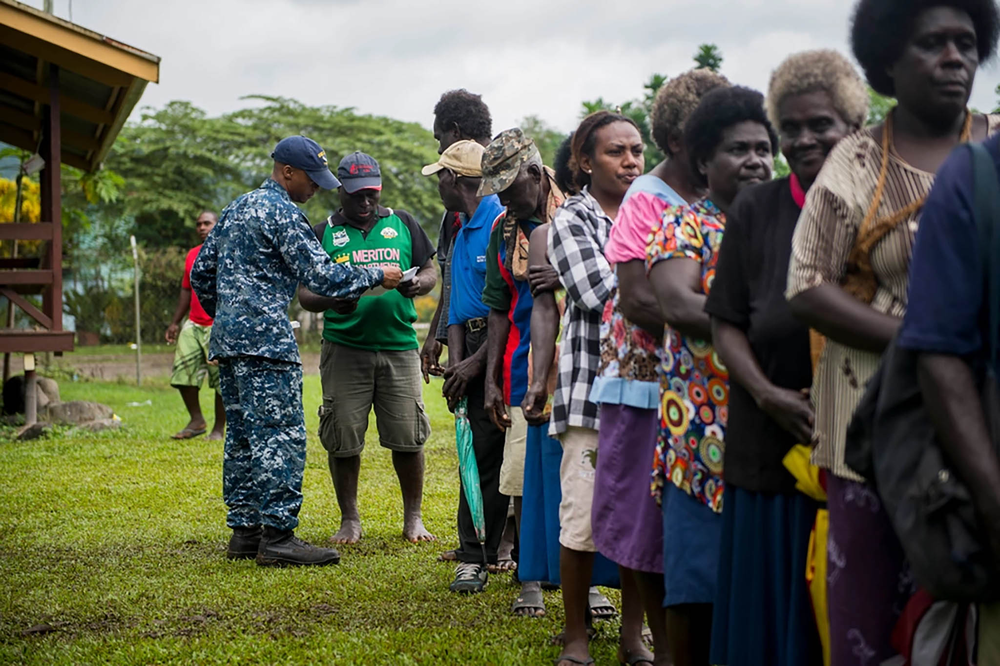 Residents of the autonomous region of Bougainville in Papua New Guinea wait in line as part of a community health engagement at the Arawa Medical Clinic, July 3, 2015. (SrA Peter Reft/DVIDS)
