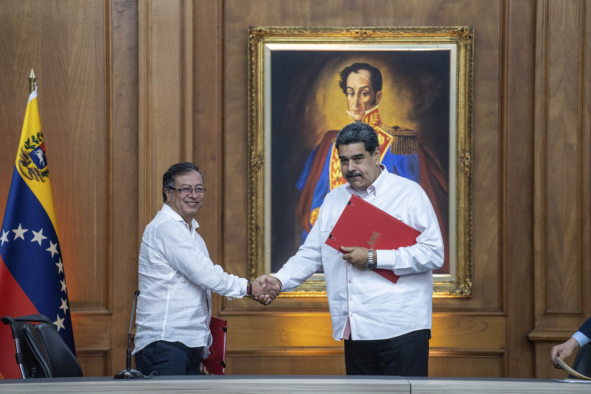 Venezuelan President Nicolas Maduro, right, and Colombia's President Gustavo Petro during a signing ceremony, Caracas, Venezuela, Nov. 1, 2022. (Federico Rios/The New York Times)