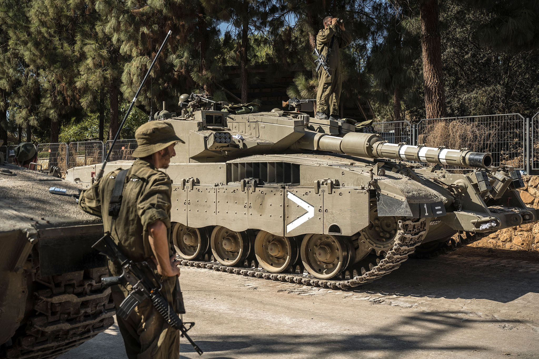 Israeli soldiers stationed in northern Israel on Oct. 25, 2023. Heavy cross-border exchanges of fire between Israel and Hezbollah have forced Israel to evacuate thousands near its northern border with Lebanon.  (Sergey Ponomarev/The New York Times)