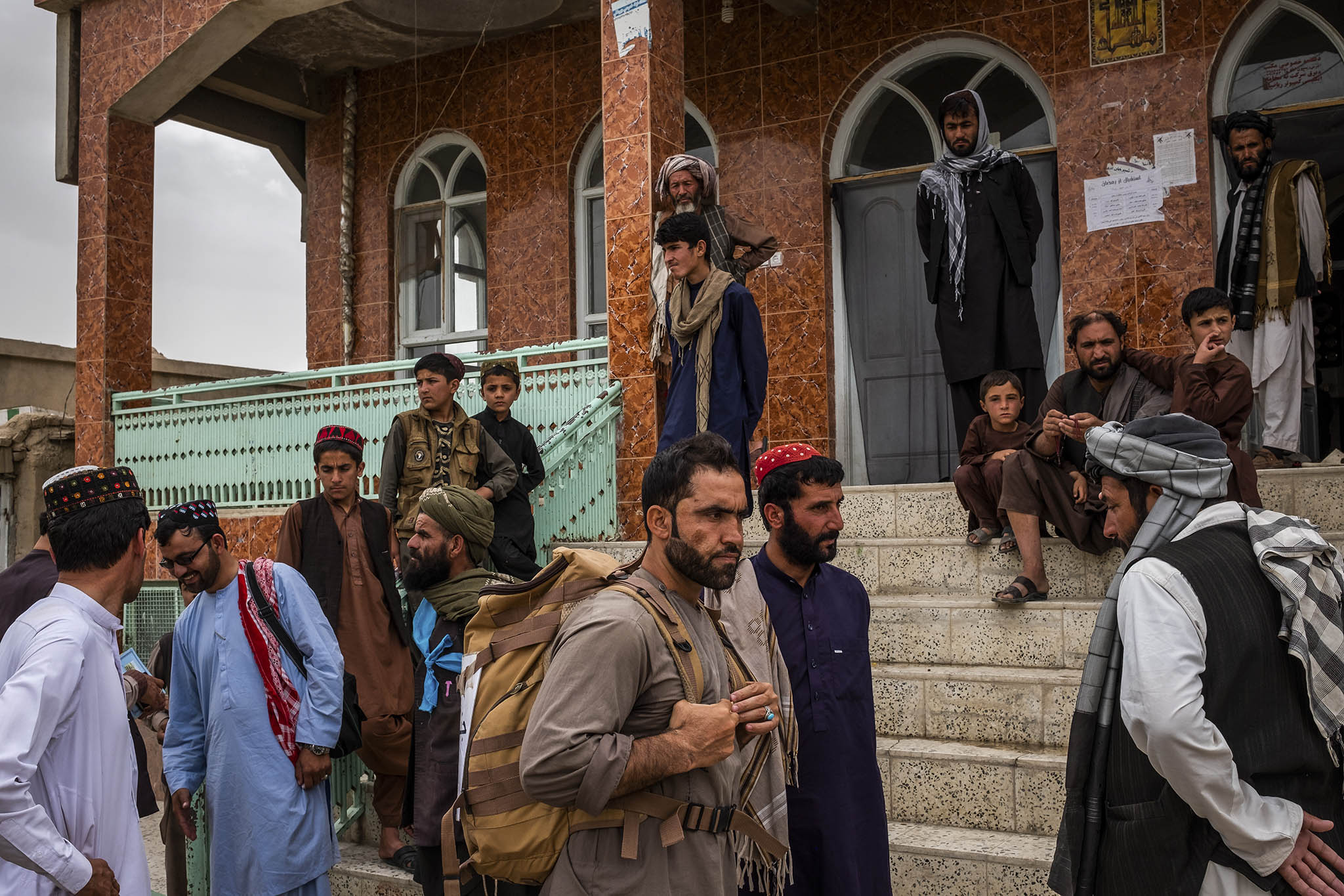 Afghans gather to march for peace from a mosque in Ghazni in 2018. Amid the Afghanistan war, U.S. military chaplains led in engaging Afghan religious communities and advising U.S. commanders on religious issues. (Jim Huylebroek/The New York Times)