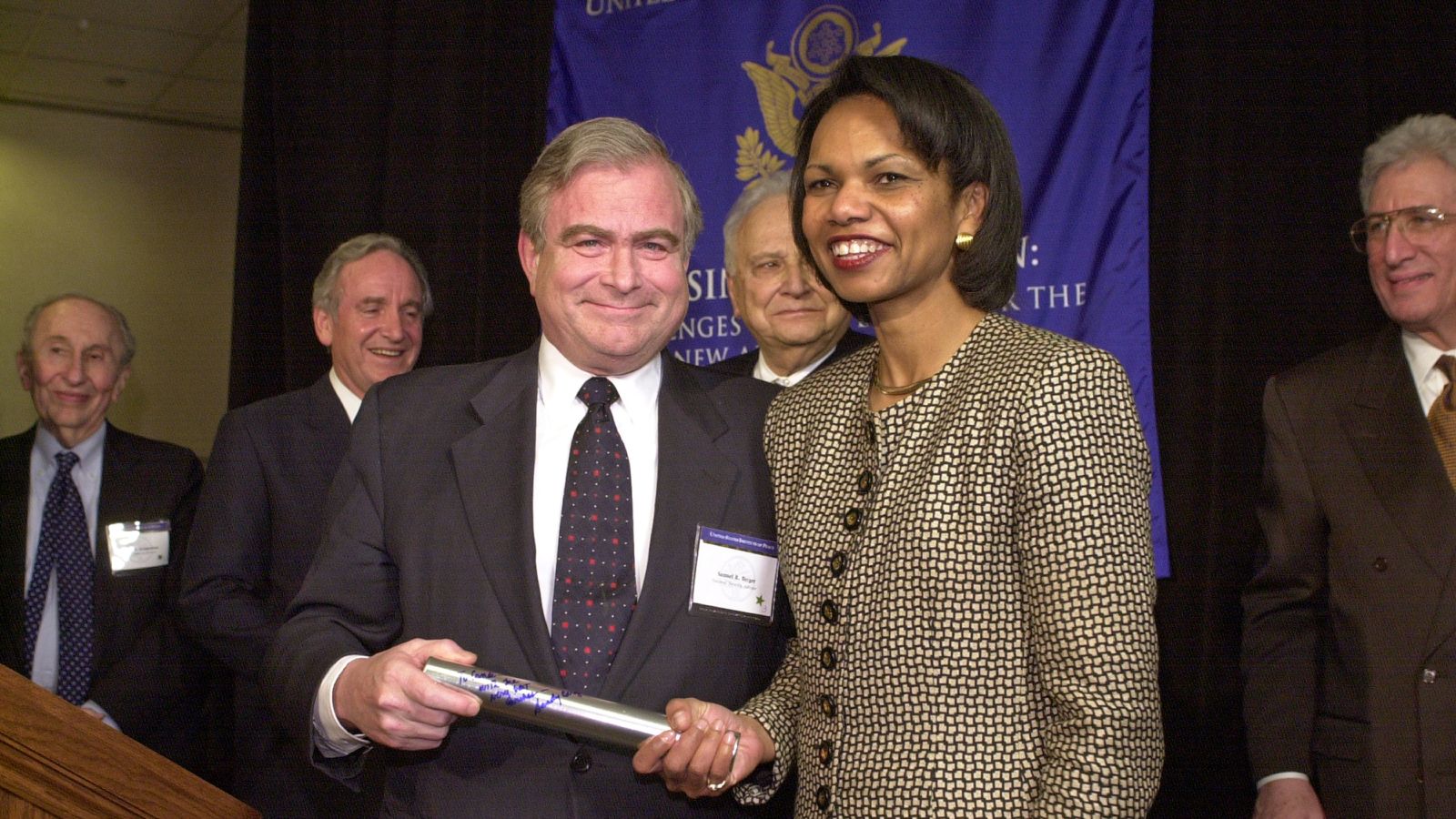 Samuel Richard "Sandy" Berger, United States National Security Advisor for President Bill Clinton passing the baton to then-incumbent Condoleezza "Condi" Rice who served United States Secretary of State under of President George W. Bush