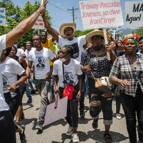 A march in memoriam of slain President Jovenel Moïse in Trou-du-Nord, Haiti, July 16, 2021. (Federico Rios/The New York Times)