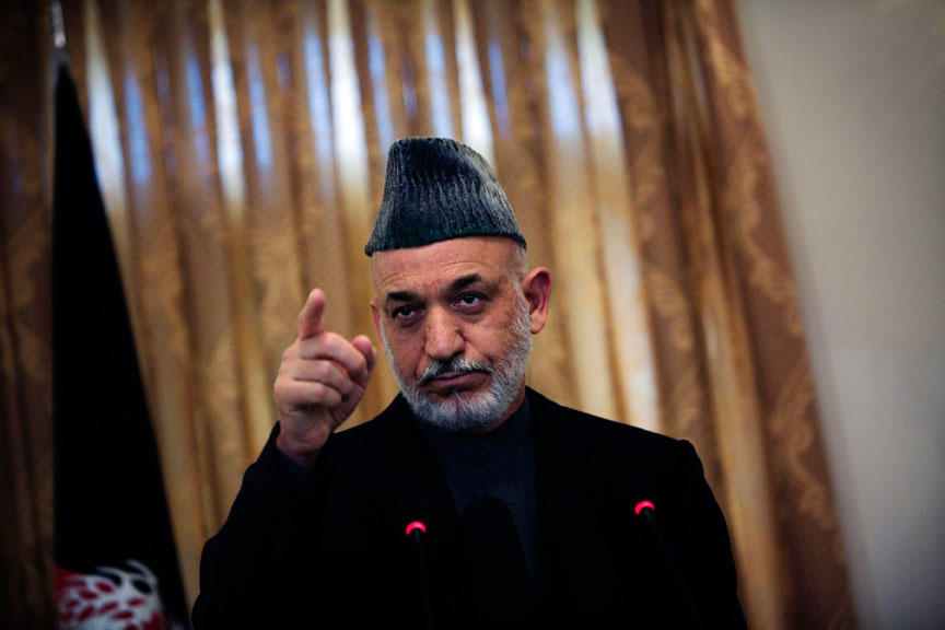 Afghan president Hamid Karzai gestures during a press conference in Kabul, Nov. 23, 2010.