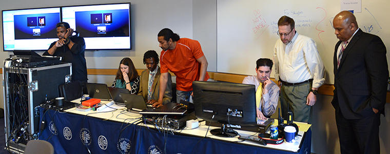 Arif Omer helps manage a March 24, 2014, USIP webcast discussion on national dialogue in Sudan.