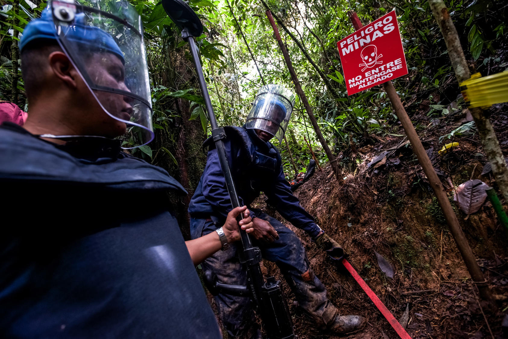 Luvin Mejia, a member of an army battalion that searches for land mines in now-peaceful areas once disputed by guerrilla fighters, uses a metal detector in the mountains outside of Cocorna, Colombia, April 9, 2015. In Colombia, a country with one of the highest numbers of land mine victims in the world, the government and the country’s largest rebel group, the Revolutionary Armed Forces of Colombia, or FARC, agreed to find and destroy land mines laid by the guerrillas.
