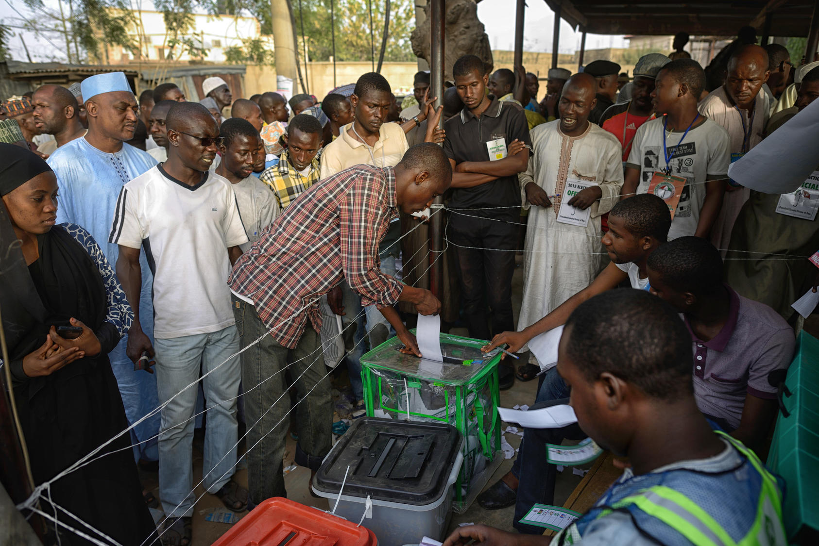 A man casts his ballot at a polling station in Kano, Nigeria, March 28, 2015. Many Nigerians fear a clash along religious, ethnic, and sectional lines regardless of the result of the presidential race between incumbent Goodluck Jonathan, a Christian from the south, and Muhammadu Buhari, a former military ruler and Muslim northerner. 