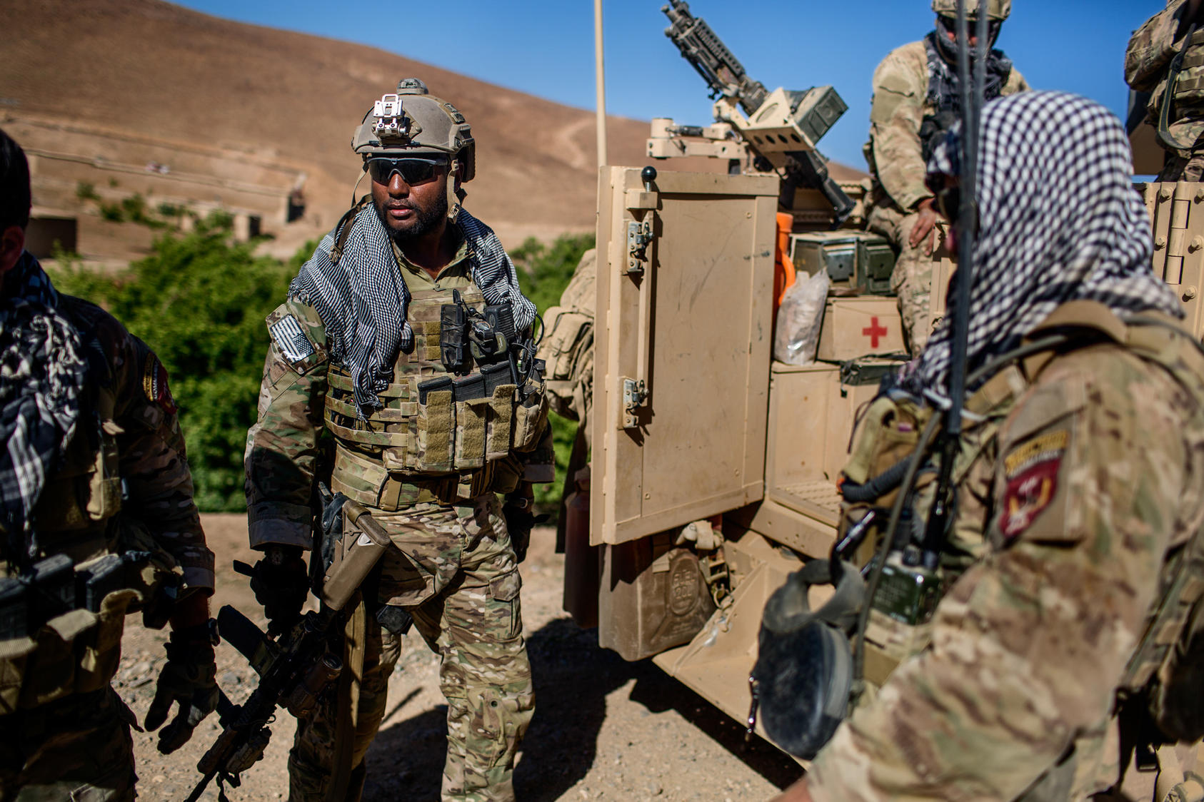 American and Afghan Special Forces soldiers during a patrol in Afghanistan's Parwan province, June 26, 2014. President Obama will announce on Thursday, Oct. 15, 2015 that the U.S. will halt its military withdrawal from Afghanistan and instead keep thousands of troops in the country through the end of his term in 2017.