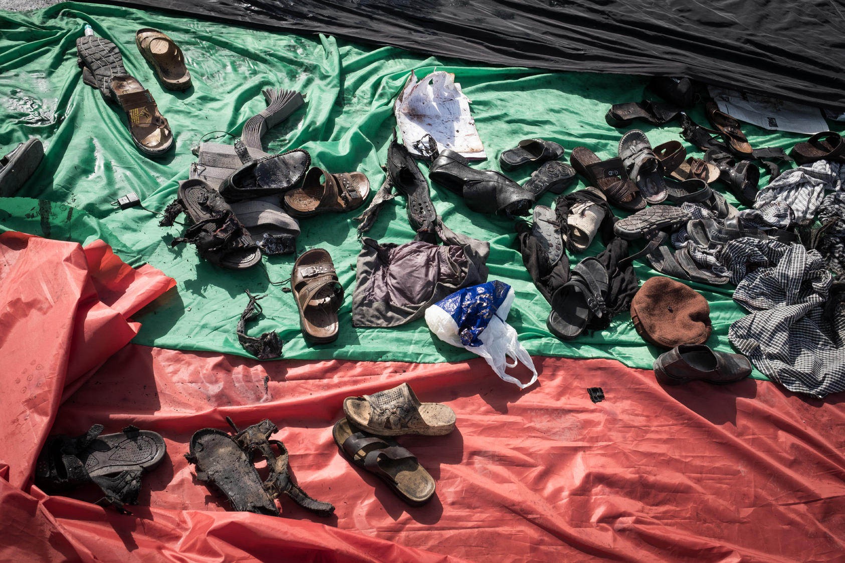 Scattered belongings after a suicide bombing targeting a demonstration by Hazaras, an ethnic minority group, in Kabul, Afghanistan