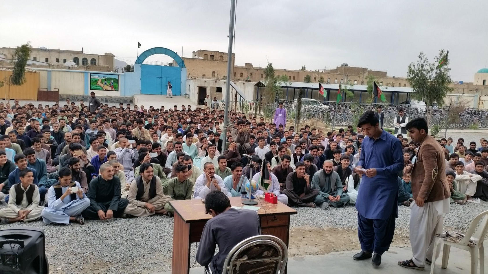 A crowd in Afghanistan’s second-largest city, Kandahar, laughs during a performance by a local youth group that dramatized corruption by Afghan officials. (Photo: Bond Street Theater)