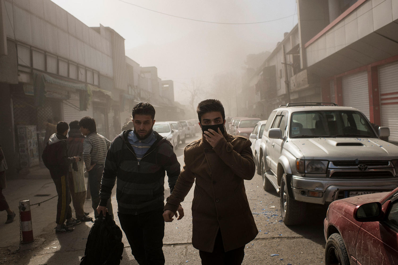 Smoke hangs in the air near the site of a bombing in Kabul, Afghanistan that killed at least 95 people, Jan. 27, 2018