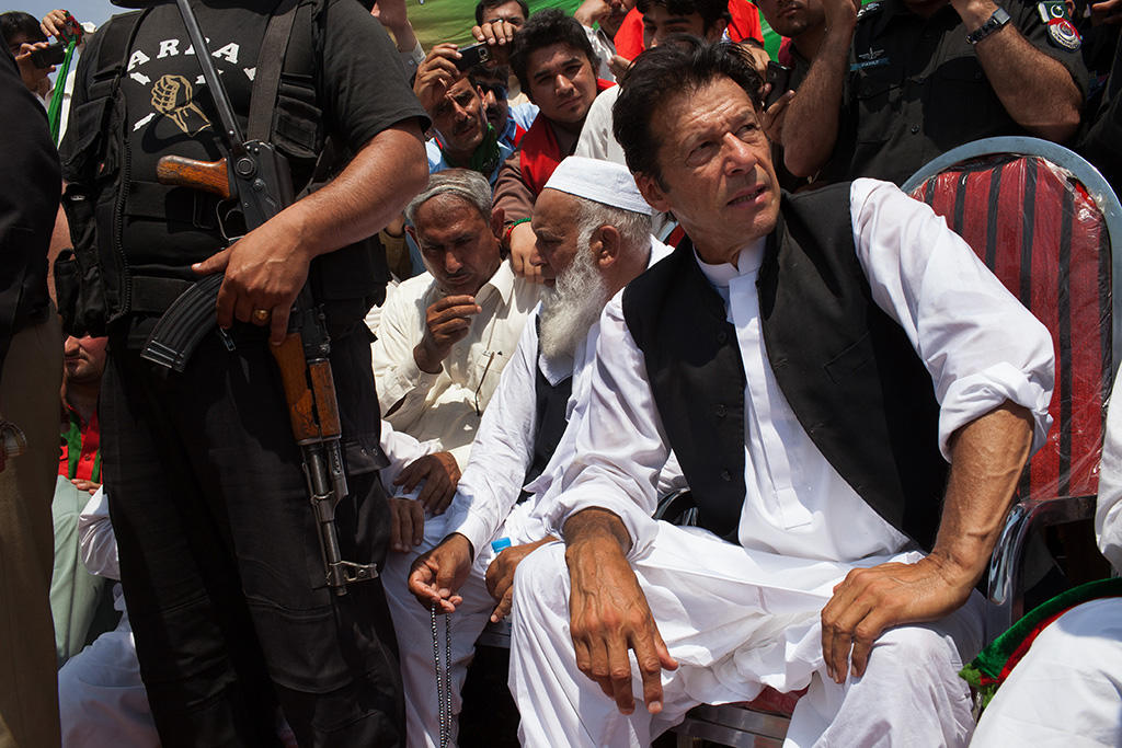 Former cricket star Imran Khan, a candidate in Pakistan's parliamentary elections, during a campaign rally in the Swabi District of Pakistan, May 4, 2013. Khan was seriously injured when he tumbled from a mechanical lift at an election rally on May 7. The vote on May 11th will be the first time a democratically elected civilian government completes its term and hands over power to another. (Tyler Hicks/The New York Times)