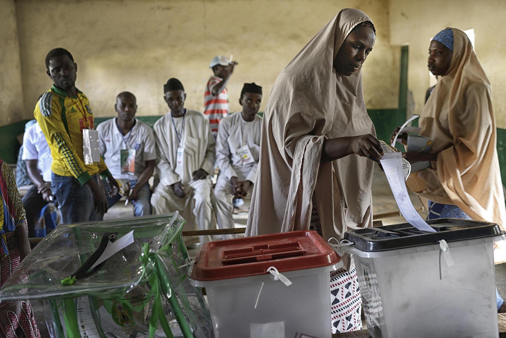 A woman votes at a polling station in Kano, Nigeria, March 28, 2015. (Samuel Aranda/The New York Times)