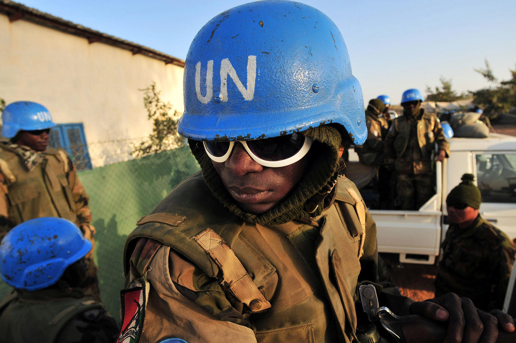 Nigerian soldiers with the United Nations peacekeeping force in Darfur prepare to head out on patrol from their base in El Geneina, Sudan, on Feb. 26, 2008. (Lynsey Addario/The New York Times)