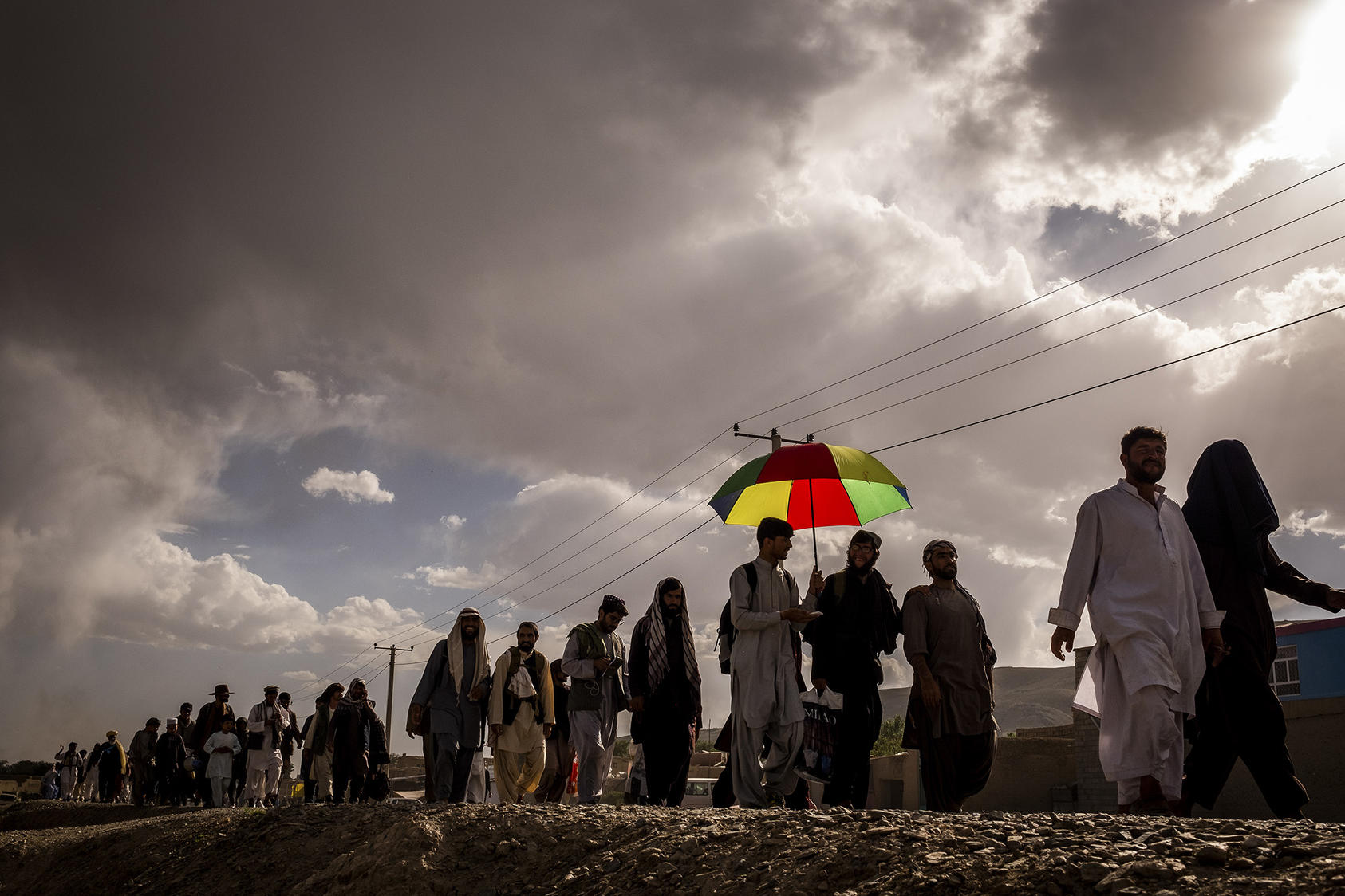 Afghan activists march toward Taliban-controlled territory in Helmand province to ask for a halt to the country’s violence, June 2, 2019. (People's Peace Movement via The New York Times)