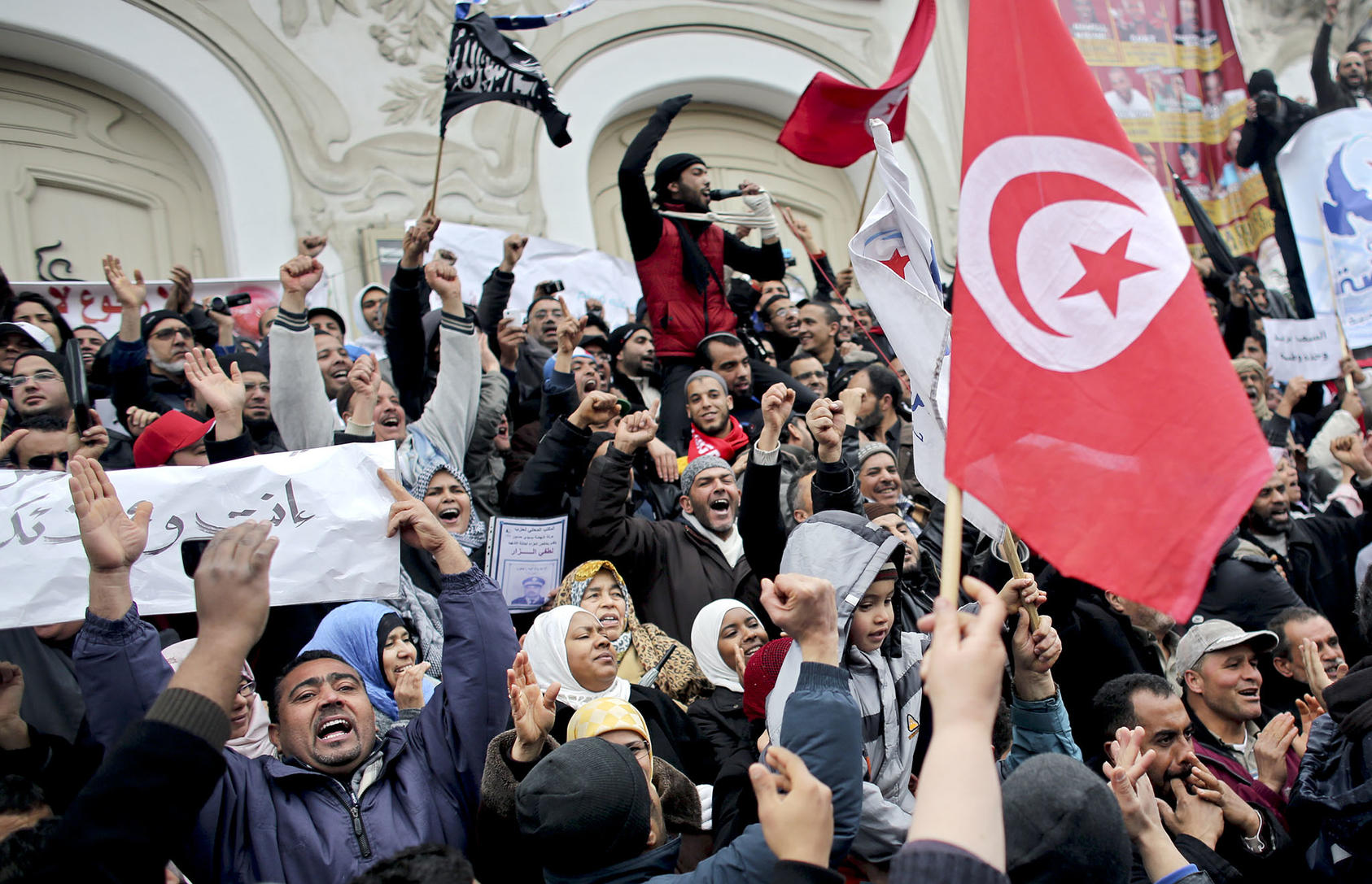People demonstrate in support of Ennahda, Tunisia’s largest Islamist party, which led a governing coalition, in Tunis, Tunisia, Feb. 9, 2013. (Tara Todras-Whitehill/The New York Times)