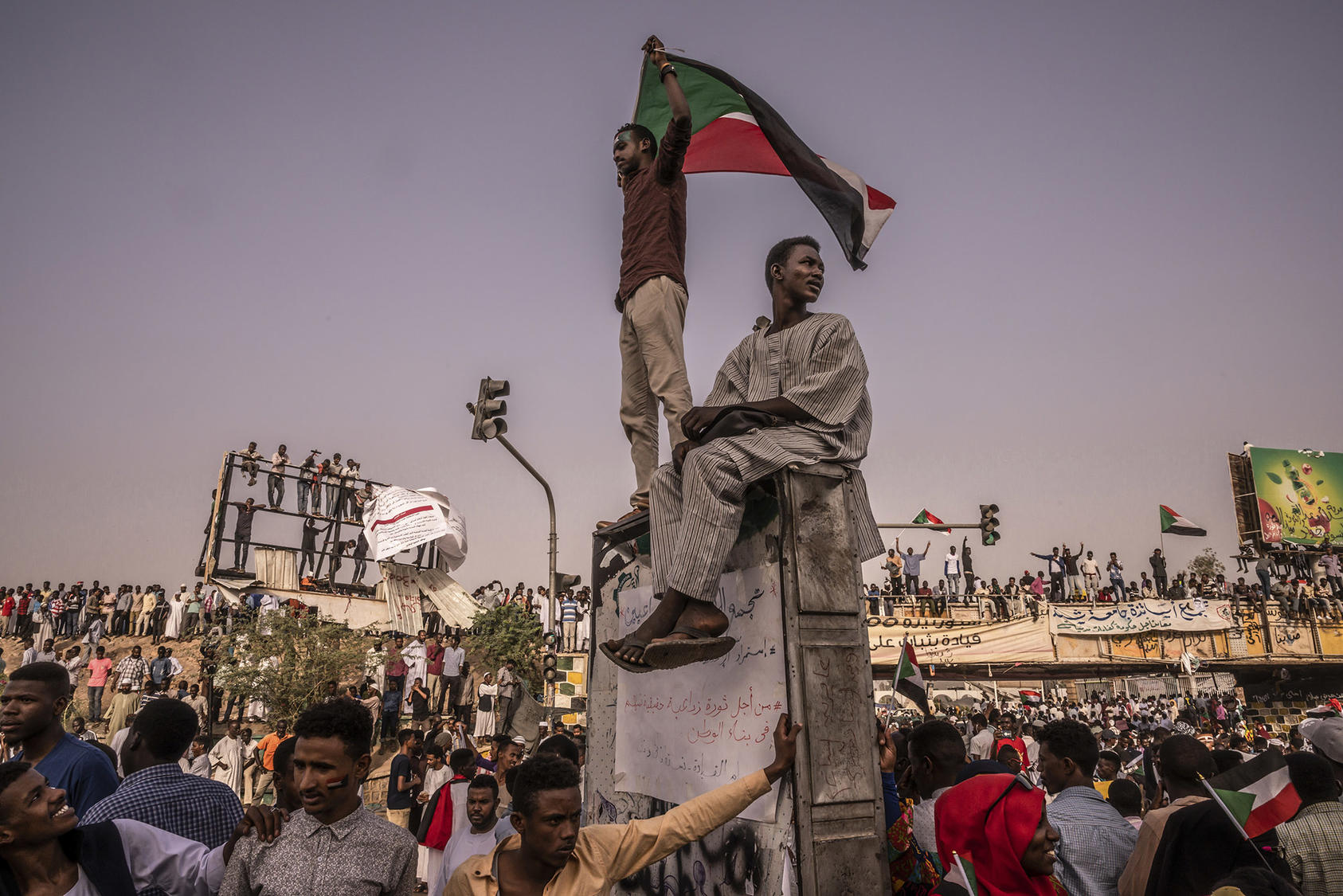 Protesters at the site of a sit-in outside the military headquarters in Khartoum, Sudan, April 19, 2019. (Bryan Denton/The New York Times)