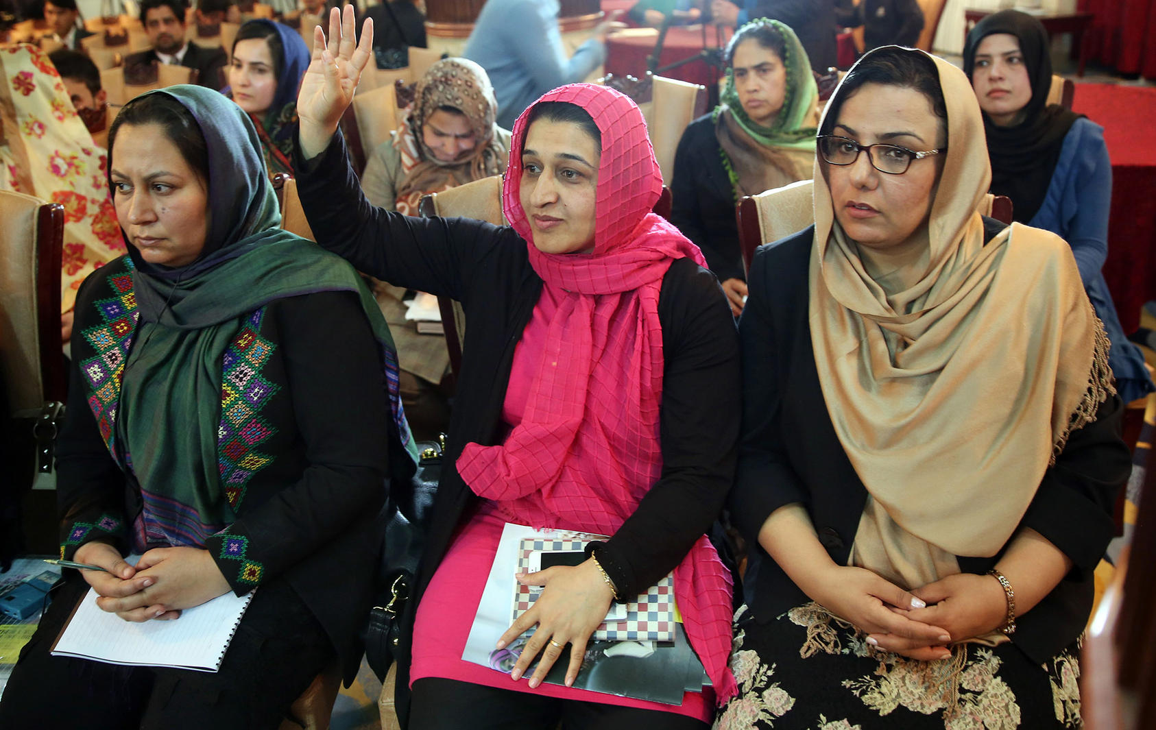 Representatives of the Taliban met with a delegation of female lawmakers and peace negotiators in June 2015, including Hasina Safi (center), executive director of the Afghan Women’s Network. (Massoud Hossaini/AP)