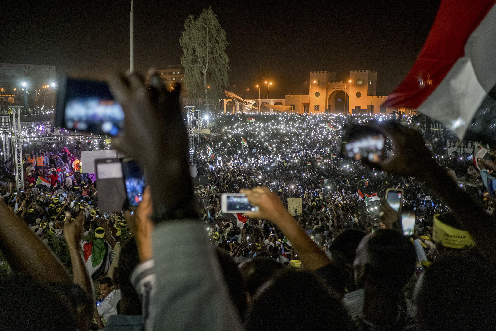 Protesters at a night rally outside the military headquarters in Khartoum, Sudan, April 21, 2019. (Declan Walsh/The New York Times)