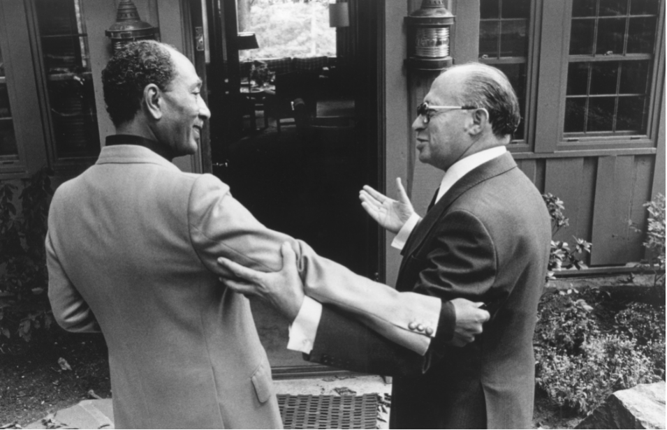The power of personal peacemaking: After getting to know each other at Camp David in 1978, old foes—Egypt’s Anwar Sadat, left, and Israel’s Menachem Begin—each insisted that the other precede him into talks with President Jimmy Carter. (Bill Fitz-Patrick)