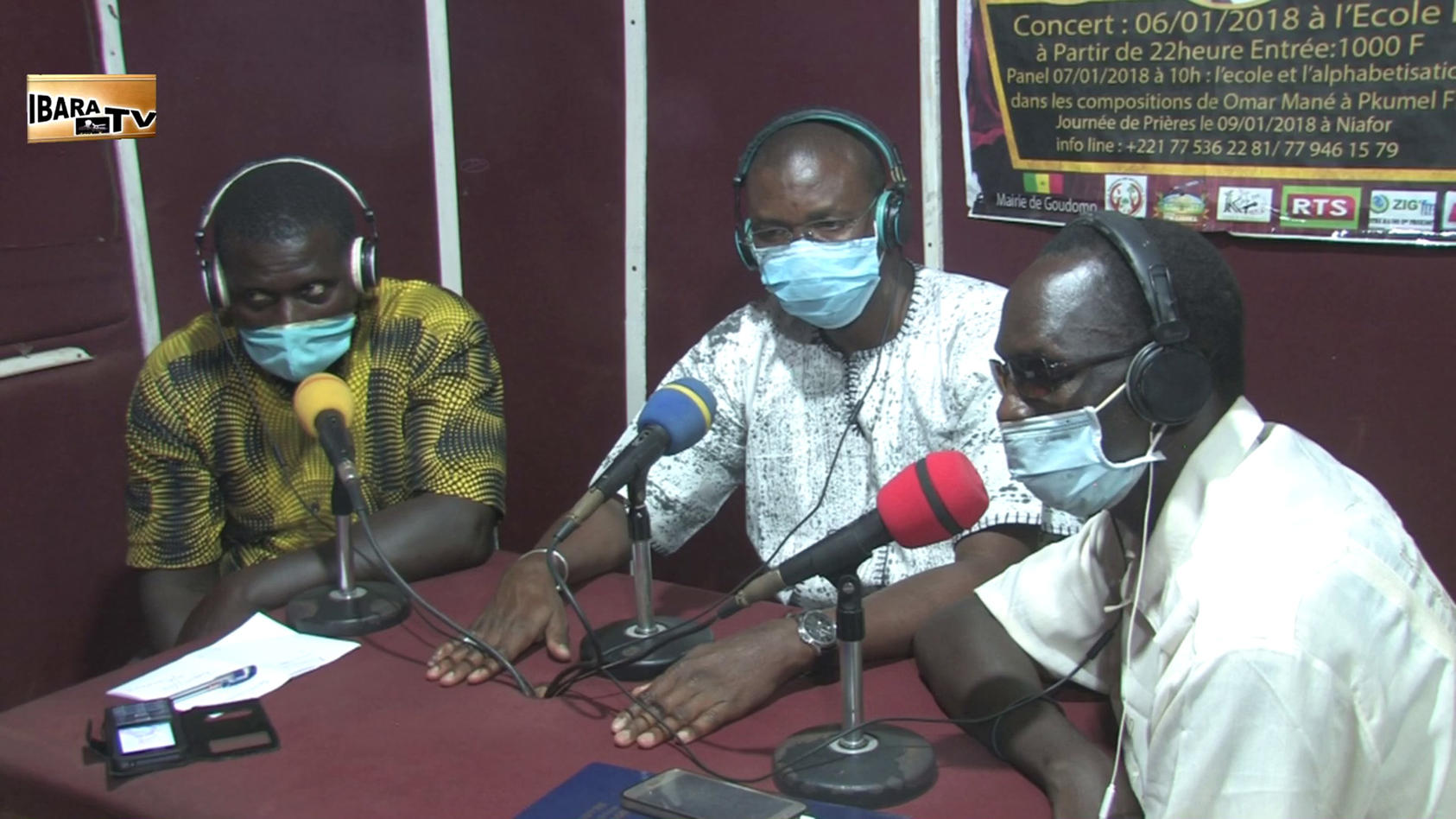 Local officials in Casamance, including Goudomp Mayor Malang Cissé (middle), host a radio town hall on the regional coronavirus response.
