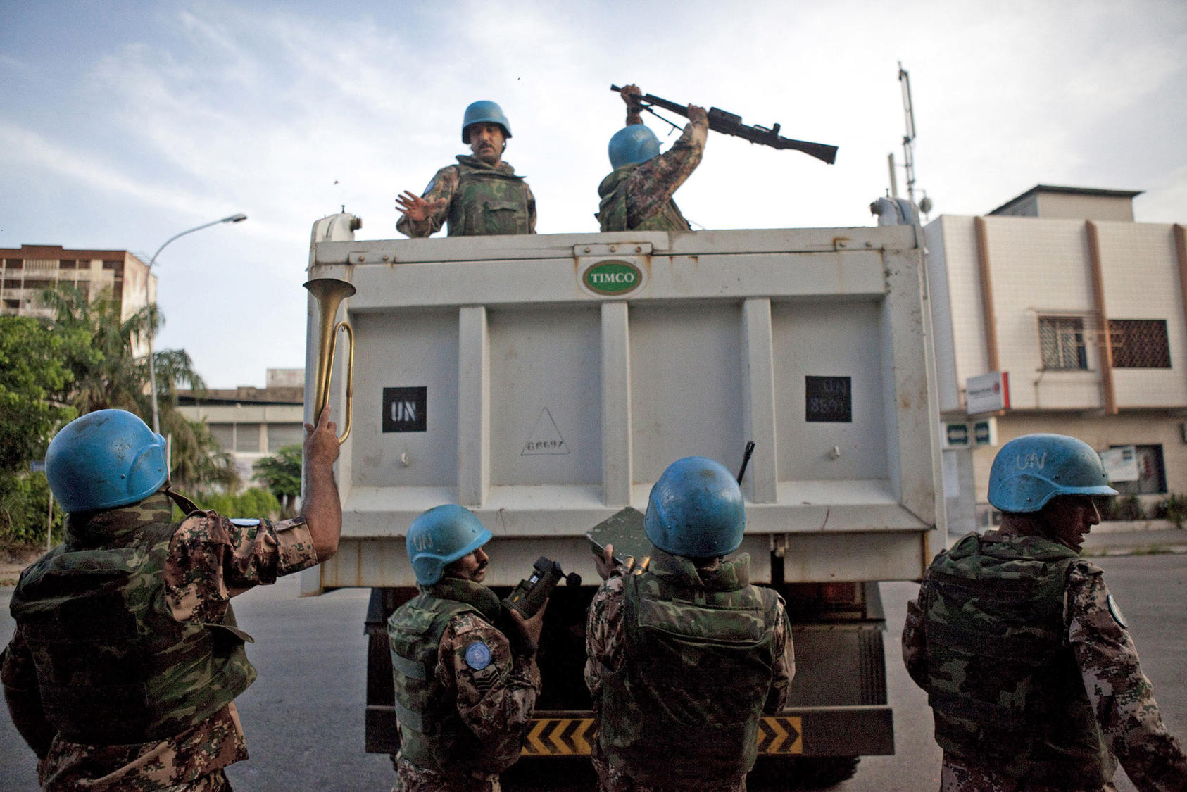 UN peacekeeping troops collect weapons and other materials from the army headquarters of Côte d’Ivoire’s strongman Laurent Gbagbo in April 2011. (Photo by Jane Hahn/AP)