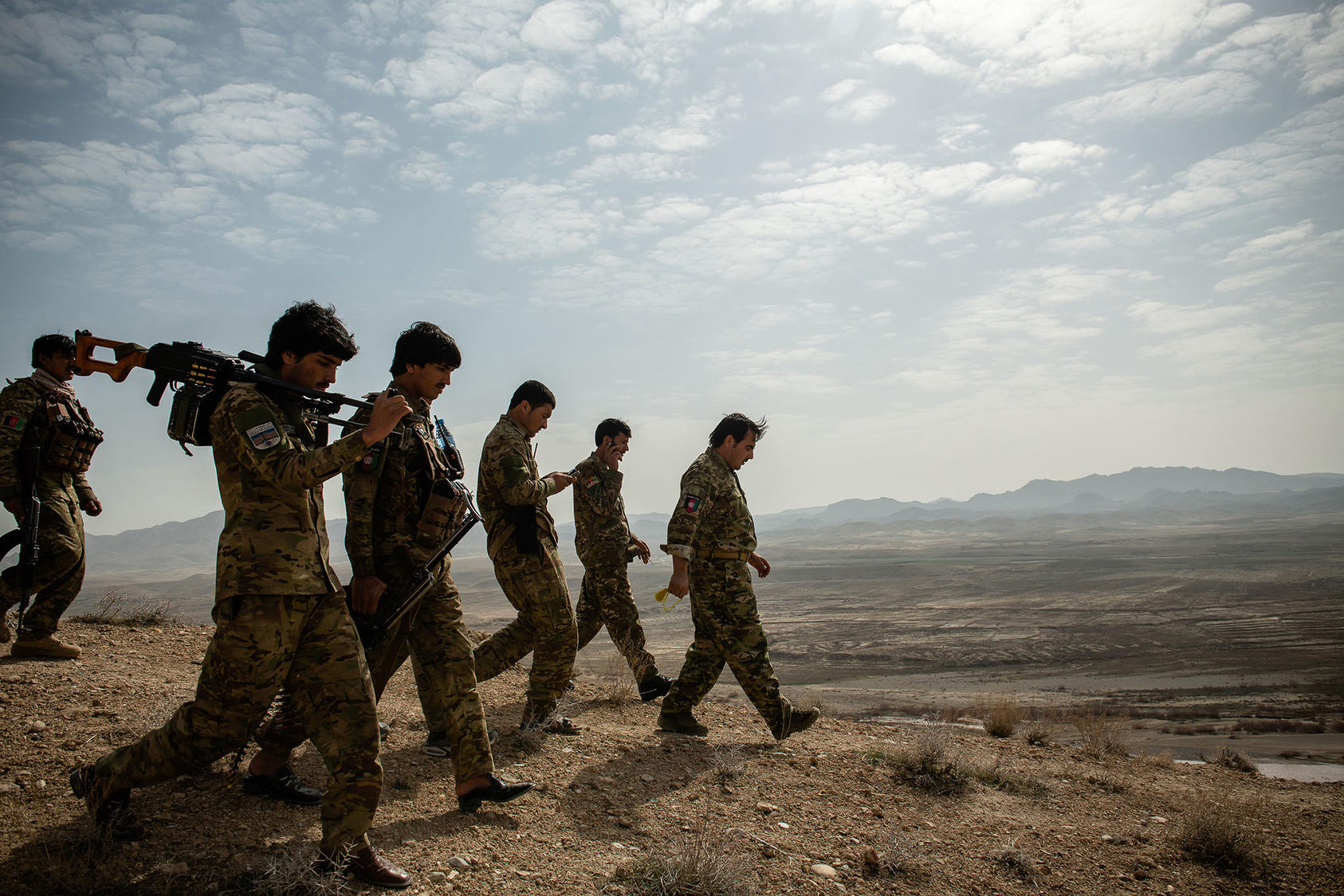 Lt. Col. Musa-Kalim Rodwal, the commander of an Afghan police unit, leads a group of police officers in Zabul Province, in Afghanistan on Sunday, Feb. 23, 2020. (Kiana Hayeri/The New York Times)
