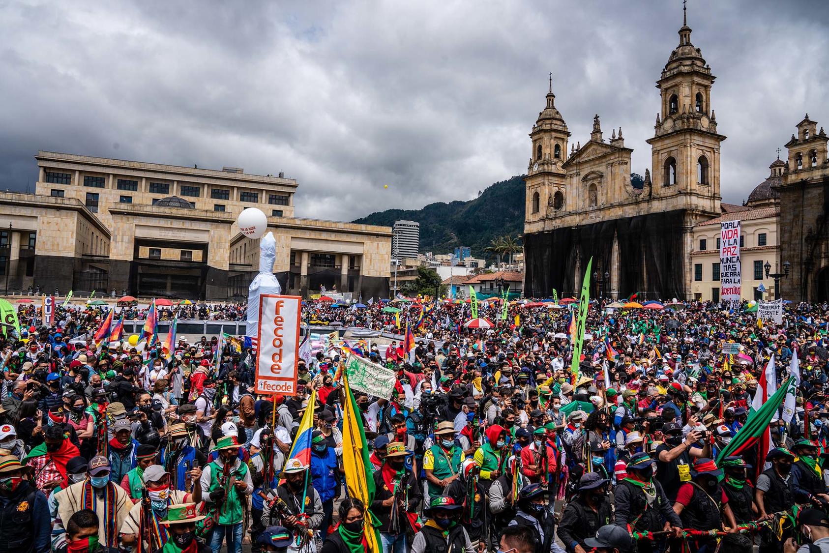 Indigenous Colombians protest in Bogotá in 2020 against mass killings of their people by drug cartels and armed groups controlling rural areas. Nonviolent protest surged worldwide last year, a trend likely to continue. (Federico Rios/The New York Times) 