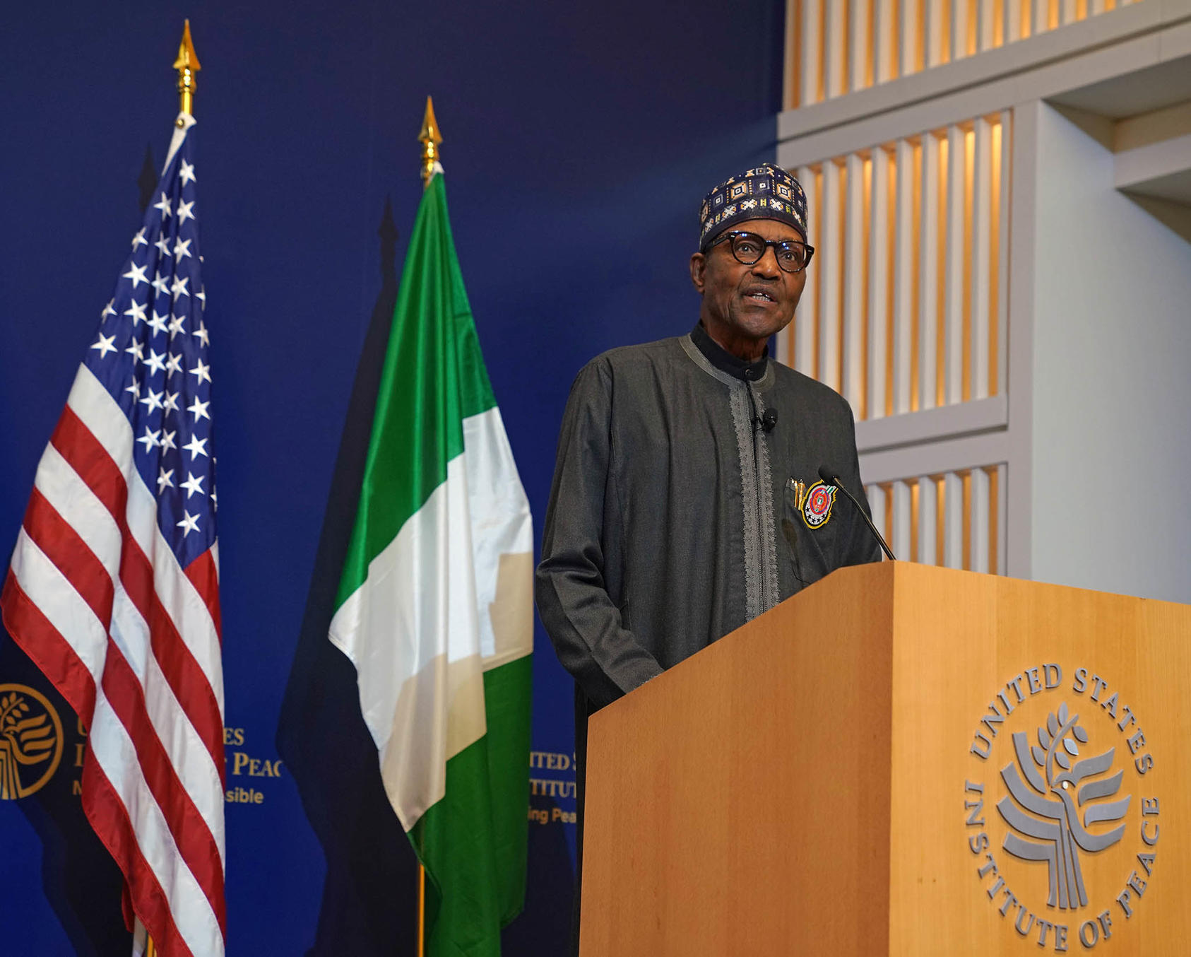 Nigeria’s President Muhammadu Buhari speaks at USIP December 16 after participating in the U.S.-Africa Leaders Summit. He underscored his vow to extend Nigeria’s democratic rule by handing power next year to his elected successor.