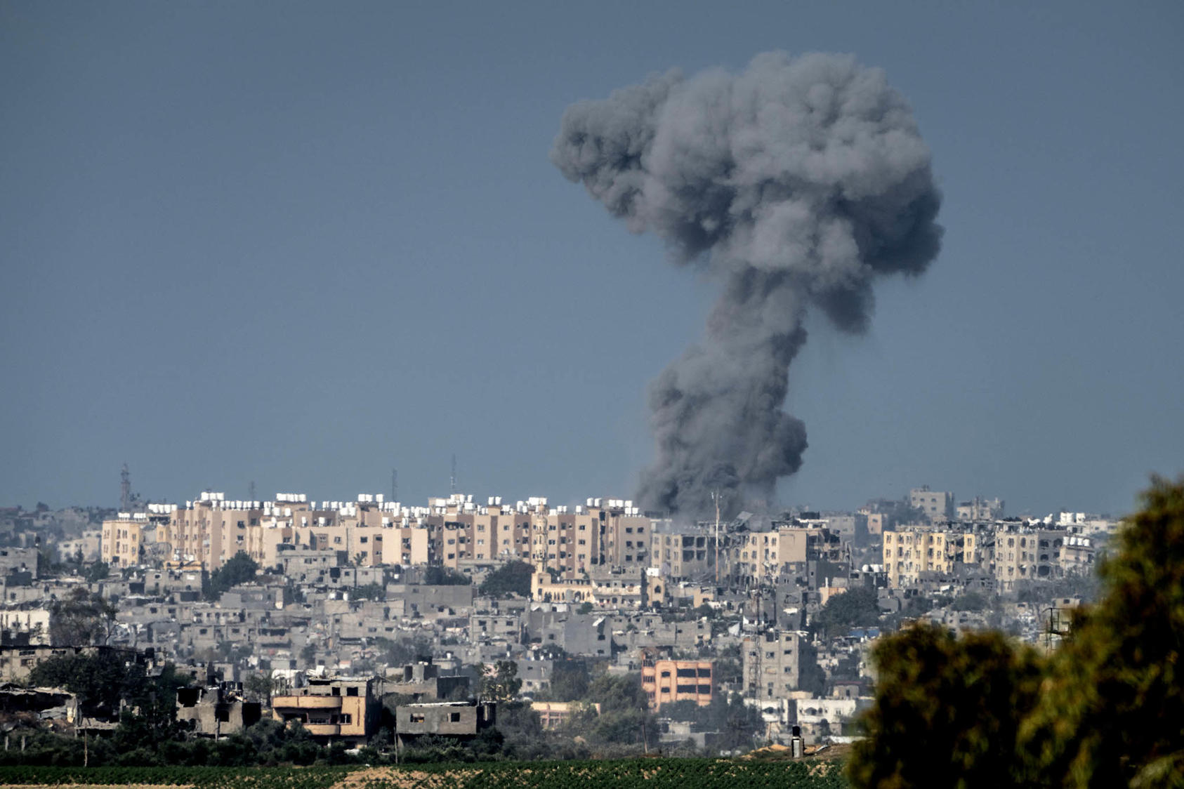 A view from Sderot, Israel, of a smoke plume as a shelling hits in Beit Hanoun, in the northeastern corner of the Gaza Strip, Oct 19, 2023. (Sergey Ponomarev/The New York Times)