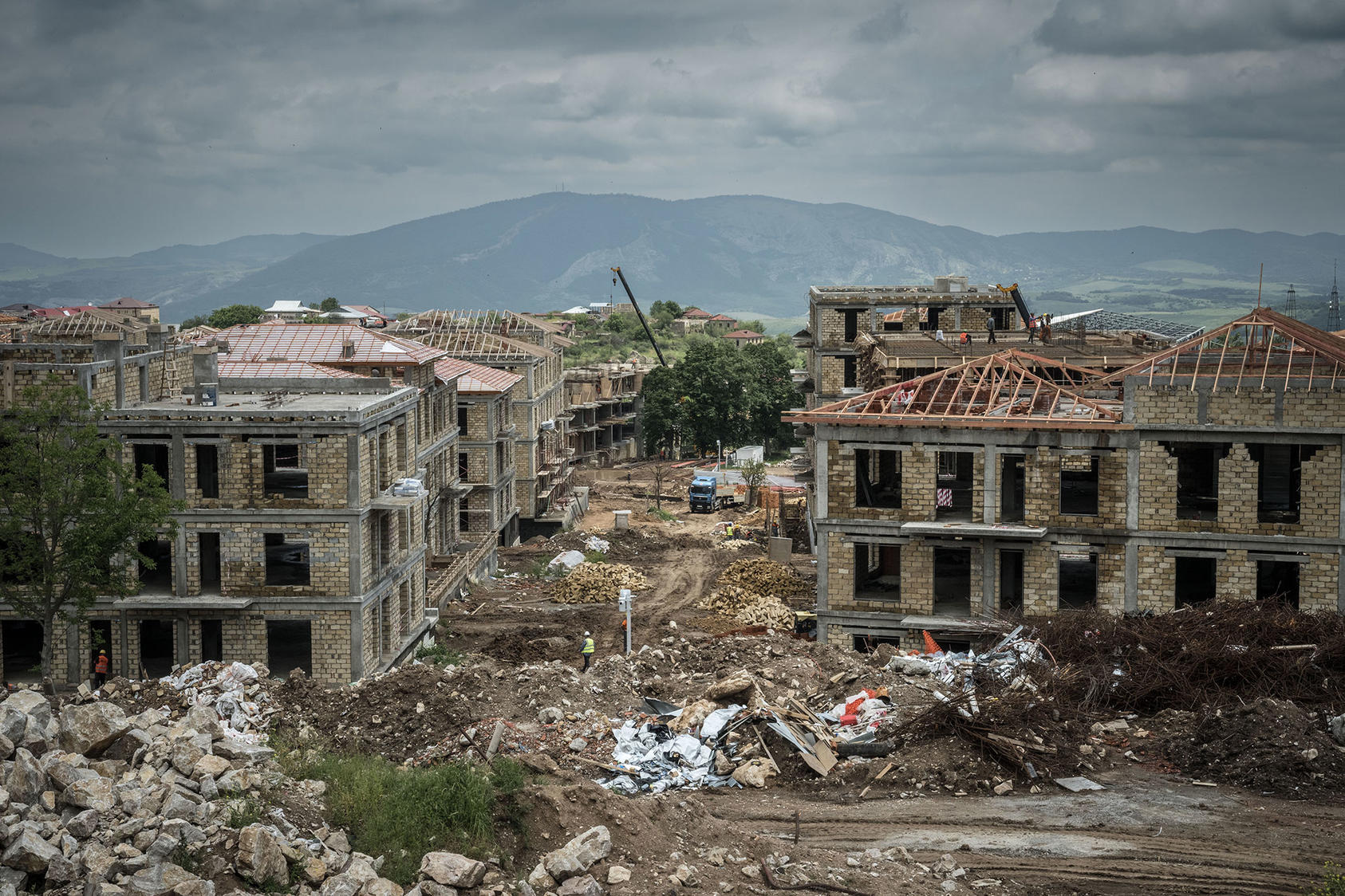 Construction in Shusha, a town in the disputed Nagorno-Karabakh region regarded by both Armenians and Azerbaijanis as central to their national identities. June 17, 2023. (Sergey Ponomarev/The New York Times)