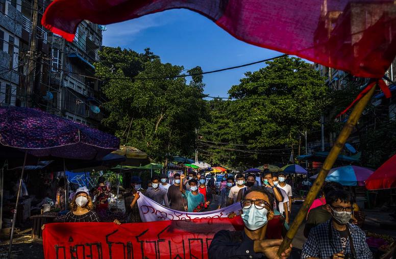 Protests against the military coup in Yangon, Myanmar, April 2021. For many of the Bamar ethnic majority now fighting for democracy, the coup has led to a realization that democracy cannot flourish without respecting minorities. (The New York Times)