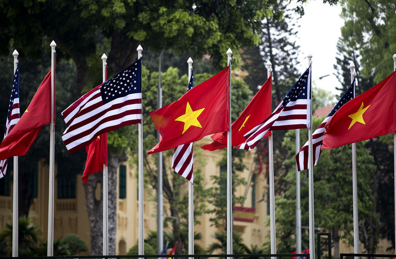 The national flags of Vietnam and the United States fly in Hanoi, Vietnam. May 23, 2016. (Doug Mills/The New York Times)