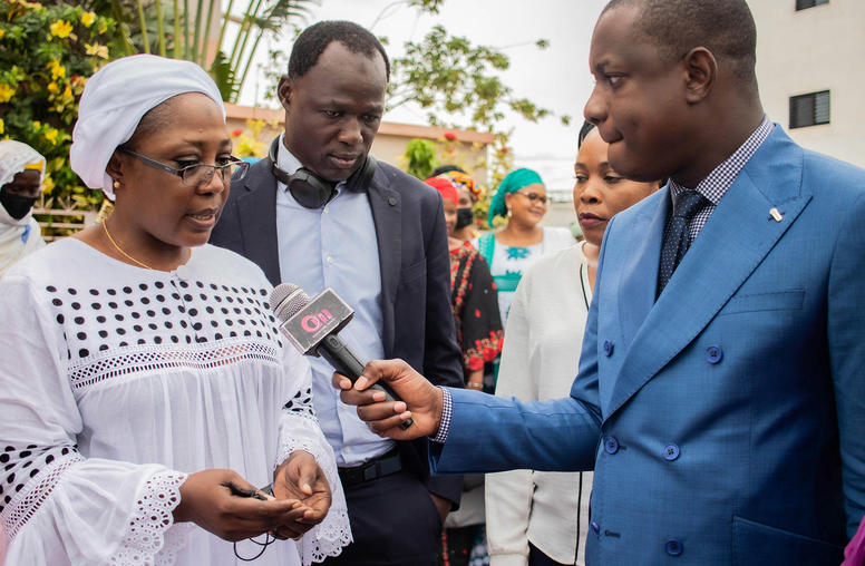 Korotoumou Thera, executive director of Femmes et Développement, speaks to local media after the USIP co-hosted Women Preventing Violent Extremism National-level Dialogue event in Bamako, Mali. September 13-15, 2021. (USIP)