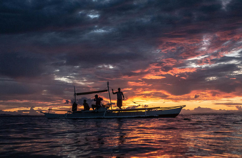 Fishermen setting out nets off the coast of Bohol, the Philippines, April 11, 2018. (Ben C. Solomon/The New York Times)
