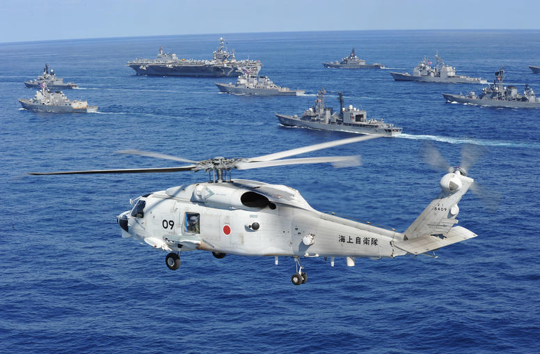 A Japan Maritime Self-Defense Force (JMSDF) helicopter conducts flight operations in the vicinity of U.S. Navy and JMSDF vessels, Dec. 10, 2010. (Japan Maritime Self-Defense Force)