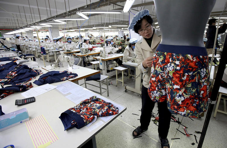 North Korean workers at an apparel factory in the Kaesong industrial park in North Korea on Dec. 19, 2013. South Korea shut down the complex in 2016 in retaliation for North Korea’s rocket launch and nuclear test. (Park Jin-Hee/Pool via The New York Times)