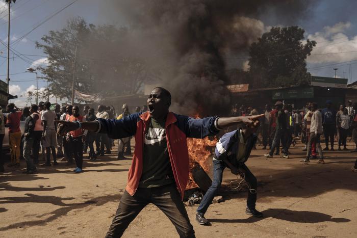 Young Kenyans protest the high cost of living in Nairobi in 2023. While Africa needs a wave of investment to meet needs of the world’s fastest-growing continental population, investments are actually shrinking. (Hannah Reyes Morales/The New York Times)