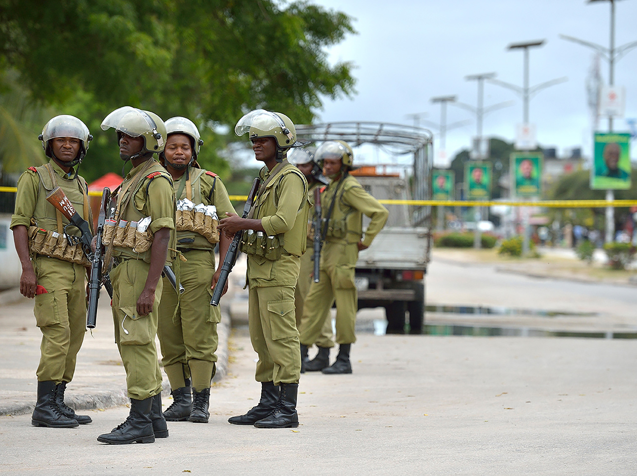 Police in Zanzibar enforce a cordon at the scene of an explosion of suspected improvised explosive devices in October 2015. (Photo by Tony Karumba/AFP/Getty Images)