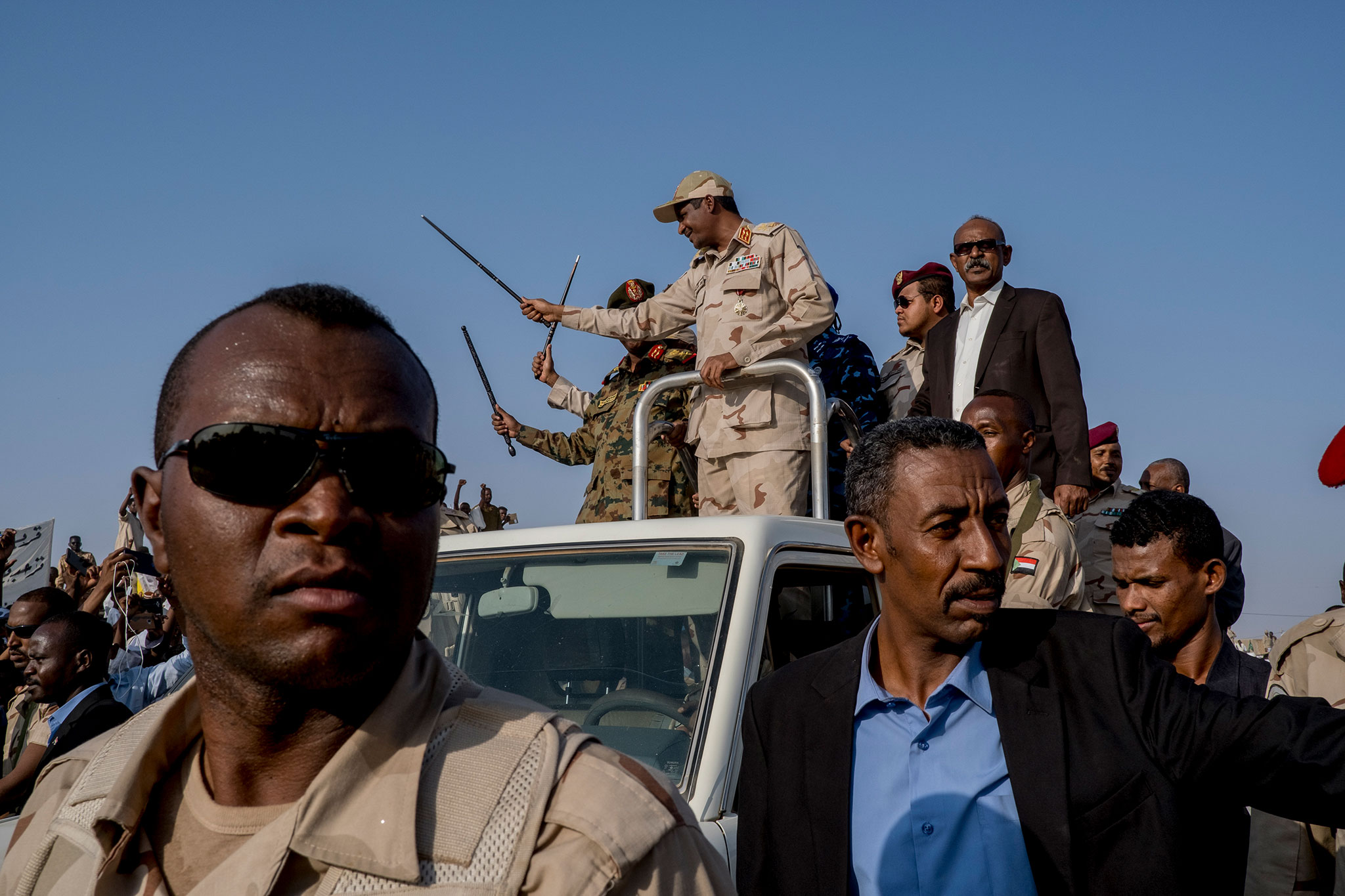 Lt. Gen. Mohamed Hamdan, center, also known as Hemeti, the de-facto ruler of Sudan, atop a truck during a rally in Galawee, Sudan, June 15, 2019.  (Declan Walsh/The New York Times)