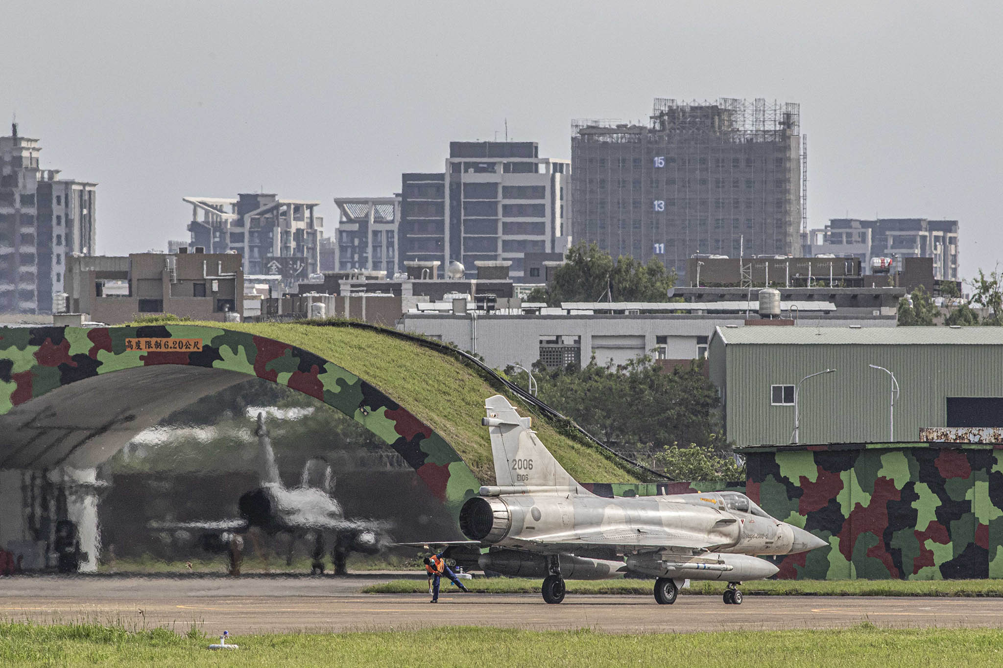 Warplanes prepare to take off at Hsinchu Military Air Base in Hsinchu, Taiwan, on May 18, 2022. (Lam Yik Fei/The New York Times)