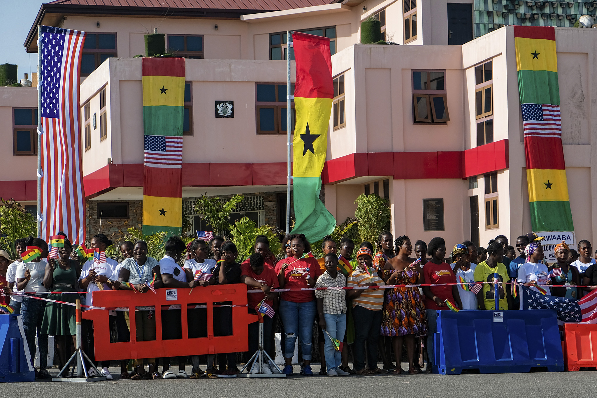 A crowd waits for Vice President Kamala Harris’ arrival at Cape Coast Castle in Cape Coast, Ghana, March 28, 2023. (Jessica Sarkodie/The New York Times)