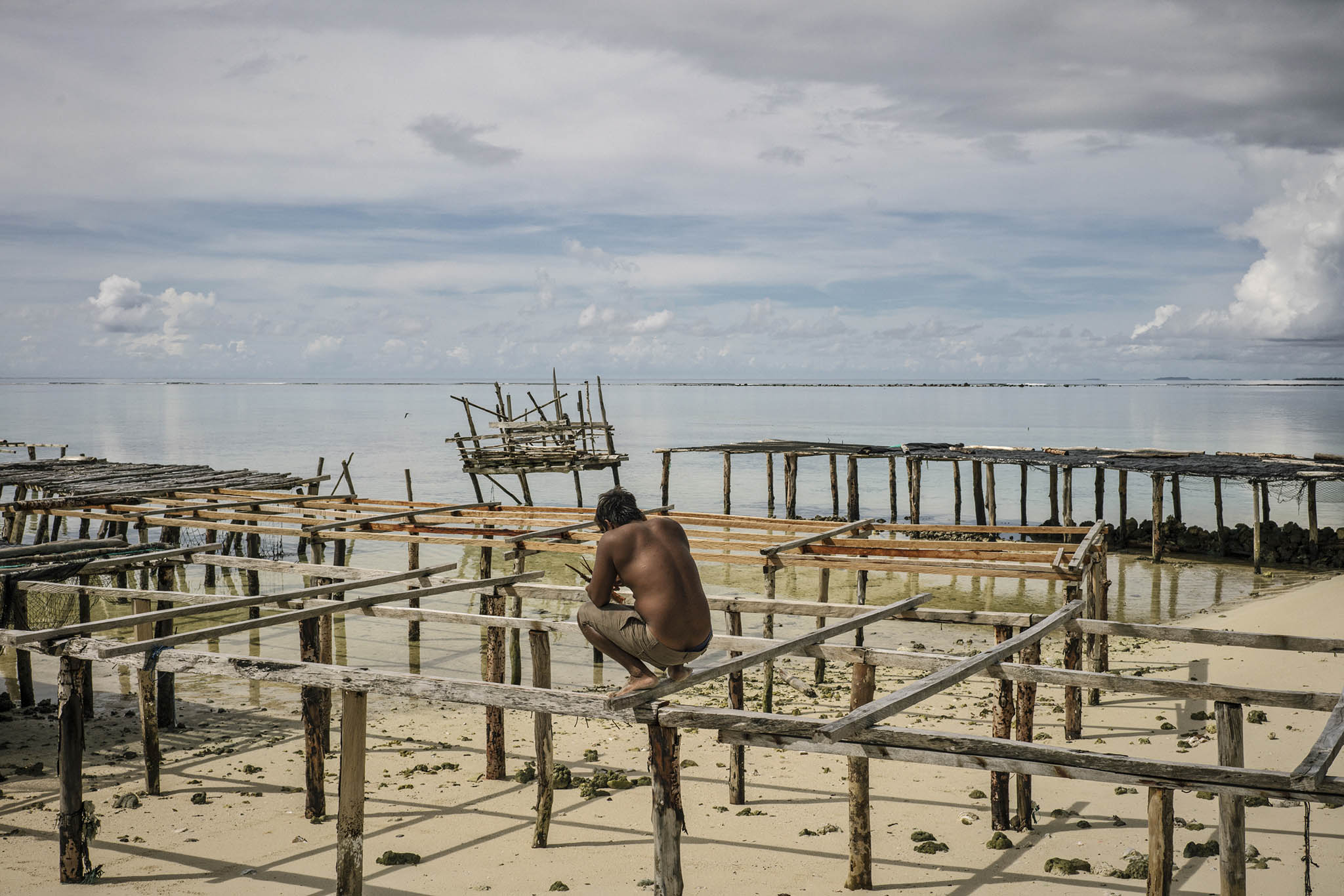 A seaweed drying dock in Beniamina Island, part of the Solomon Islands. June 5, 2018. (Adam Ferguson/The New York Times)