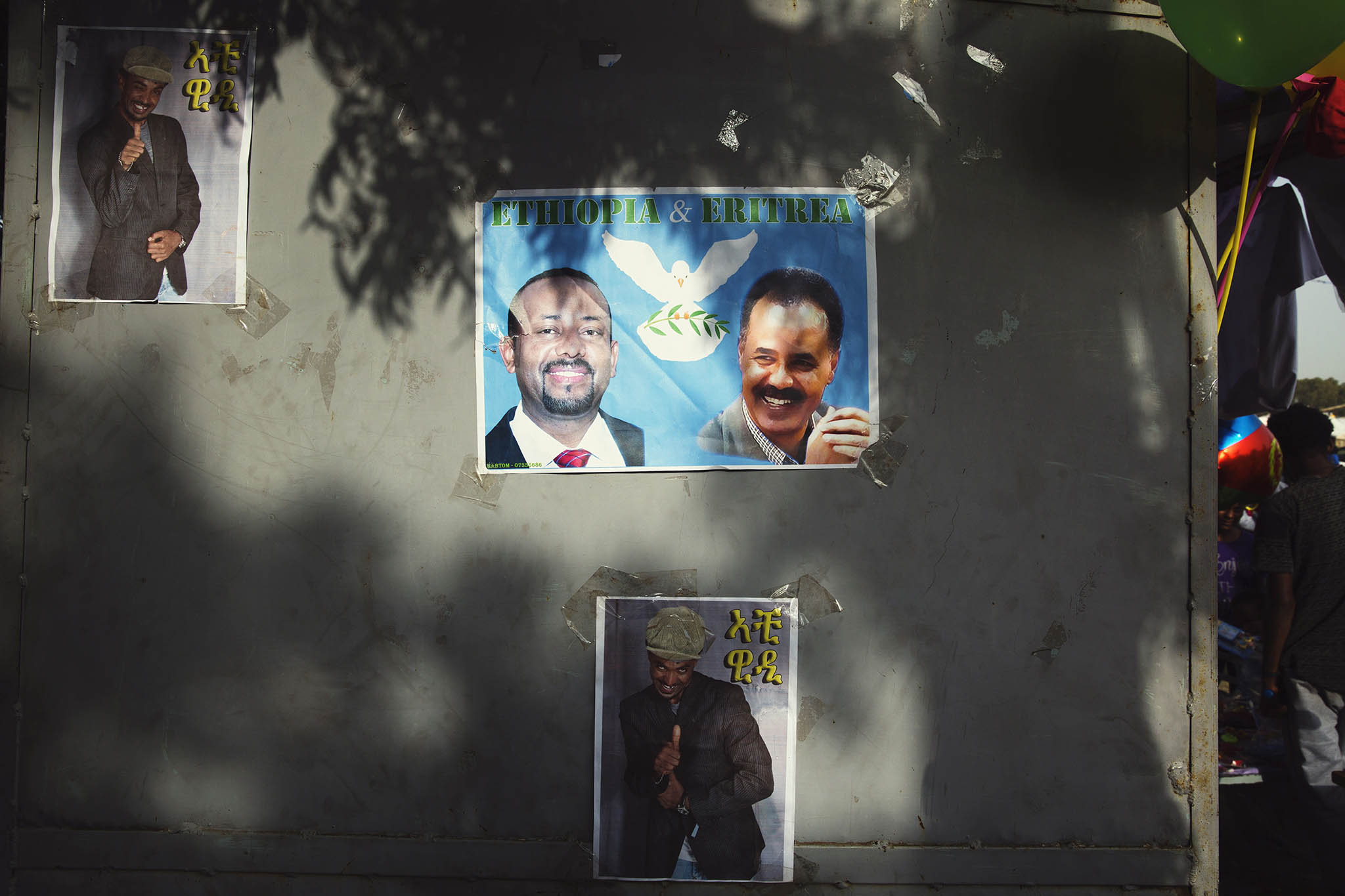 A poster depicts Ethiopian Prime Minister Abiy Ahmed (left) and Eritrean President Isaias Afwerki in Asmara, Eritrea, on September 7, 2018. Tensions between the two countries have been rising again. (Malin Fezehai/The New York Times)