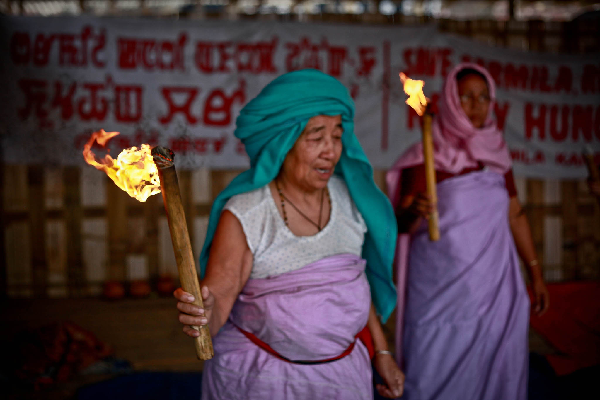 A woman participates in the Meira Paibi movement in Imphal in the Manipur region of India. March 10, 2009. (lecercle/Flickr)