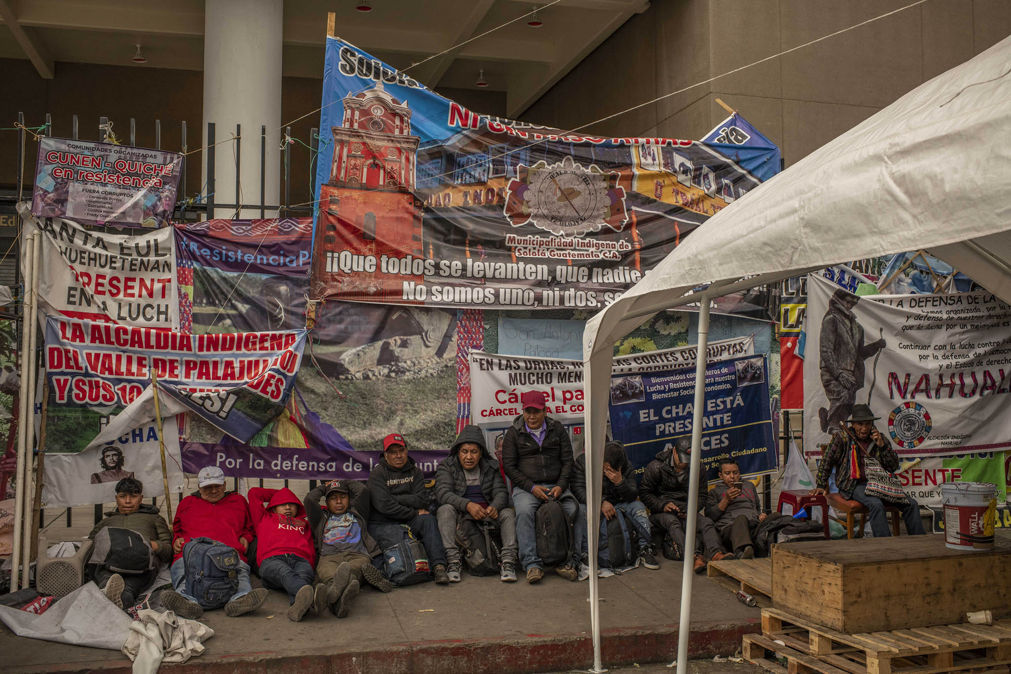 Indigenous protesters camp in front of the attorney general’s office, demanding her resignation for targeting Bernardo Arévalo, the president-elect with investigations, in Guatemala City, Nov. 28, 2023. (Daniele Volpe/The New York Times)