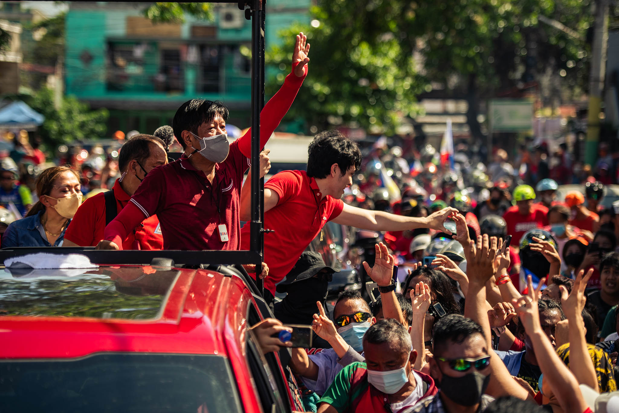 Ferdinand Marcos Jr. waves from a campaign motorcade, March 22, 2022. Since taking office, Marcos has reoriented Manilla’s foreign policy, tightening ties with Washington and pushing back on Beijing. (Jes Aznar/The New York Times)